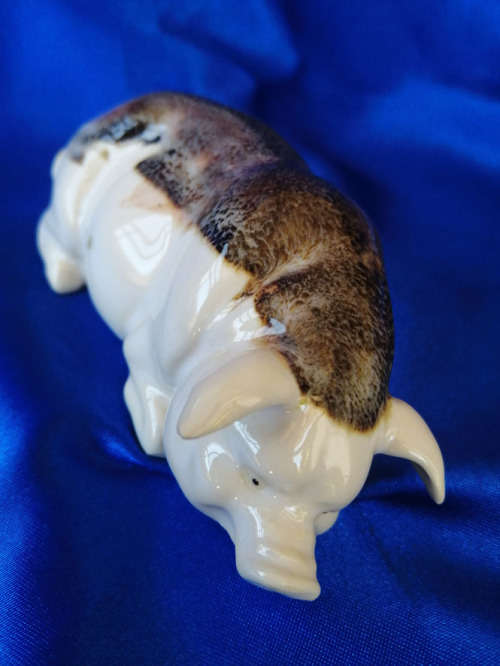 Cream and Brown Porcelain Lying Pig *