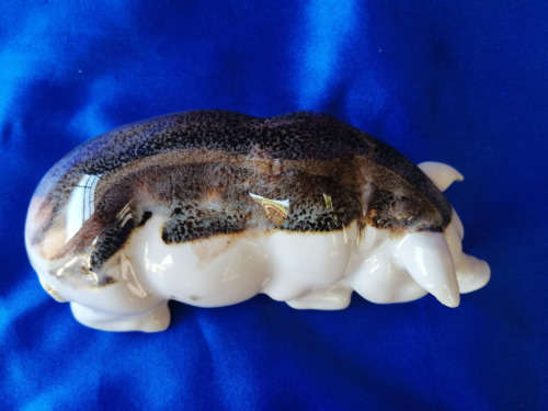 Cream and Brown Porcelain Lying Pig *