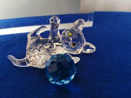 Swarovski Crystal Kitten playing with a blue ball of wool