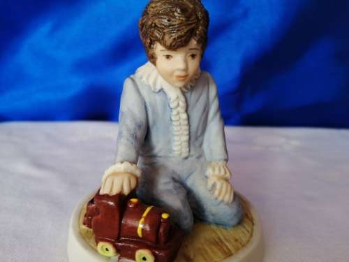Wedgwood Boy Playing with train Figure
