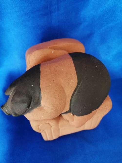 Vintage Large Pottery Pig Sleeping on a Chair