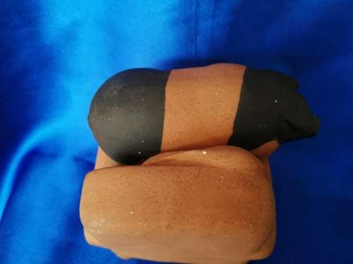 Vintage Large Pottery Pig Sleeping on a Chair