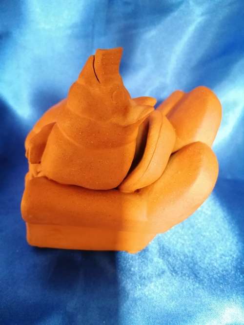 Vintage Large Pottery Pig Sleeping on a Chair