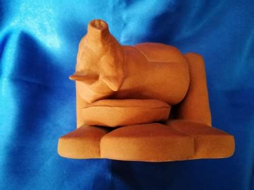 Vintage Large Pottery Pig Sleeping on a Chair