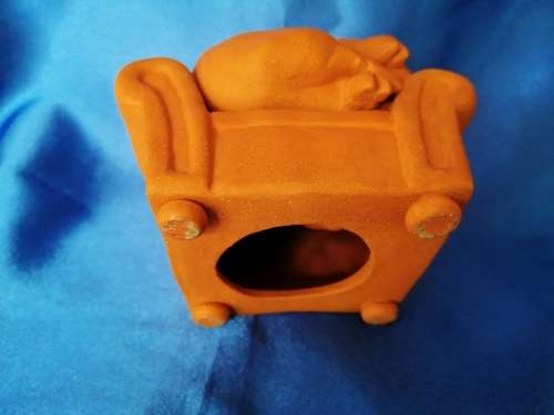 Vintage Large Pottery Pig Sleeping on a Chair
