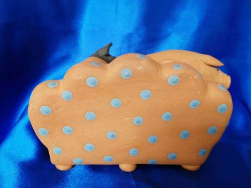 Vintage Large Pottery Pigs Sleeping on a Chair