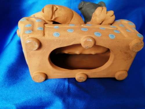 Vintage Large Pottery Pigs Sleeping on a Chair
