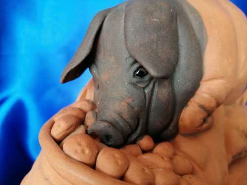 Vintage Large Pottery Pig eating a bag of apples