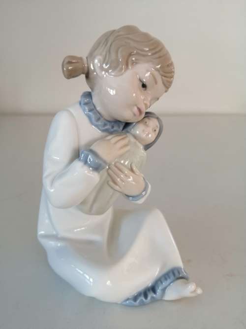 Nao by Lladro figurine, `Girl with Pigtails and Baby Doll` #5102