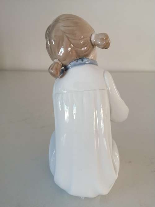 Nao by Lladro figurine, `Girl with Pigtails and Baby Doll` #5102