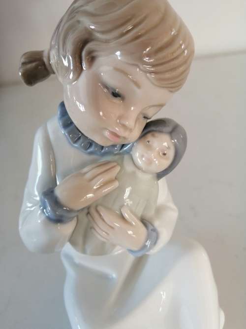 Nao by Lladro figurine, `Girl with Pigtails and Baby Doll` #5102