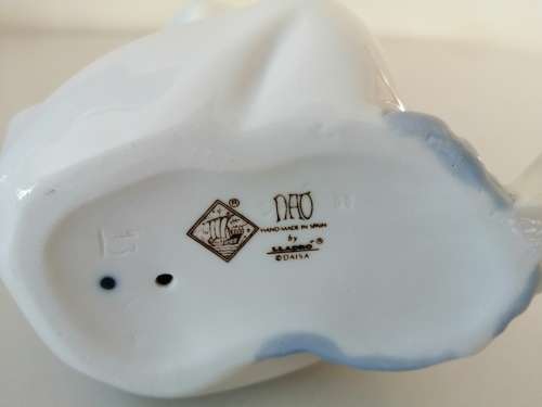 Nao by Lladro figurine, `Girl with Pigtails and Baby Doll` #5102