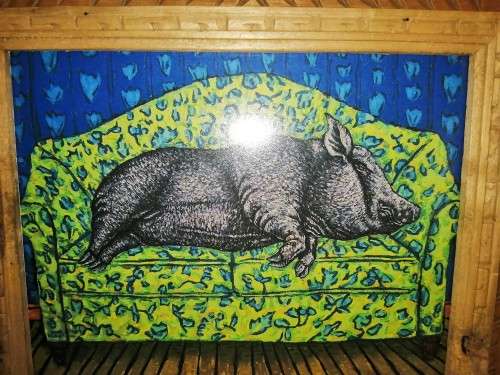 Carved wooden framed print pig sleeping on the sofa #