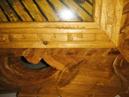 Carved wooden framed print pig sleeping on the sofa #