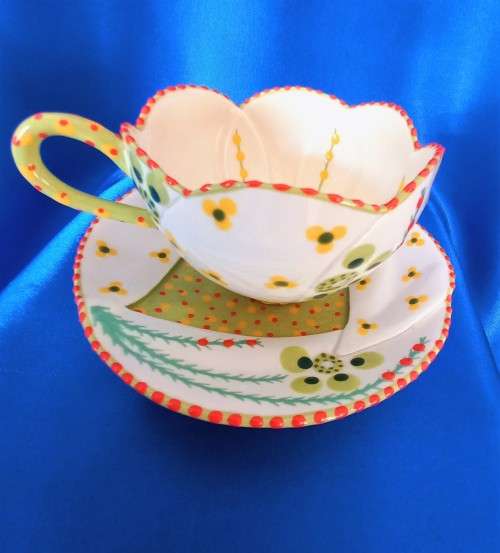 Stunning Hand Painted Cup and Saucer
