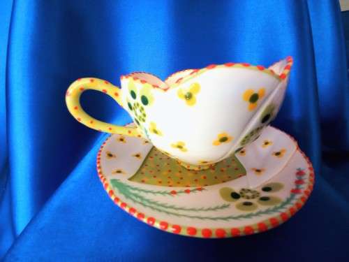 Stunning Hand Painted Cup and Saucer