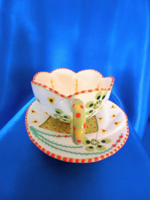 Stunning Hand Painted Cup and Saucer