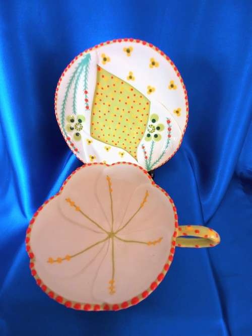 Stunning Hand Painted Cup and Saucer