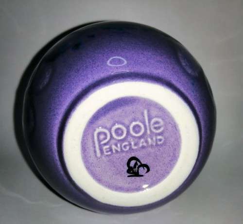 A stunning blend of blue, indigo and violet glazes, this eye-catching Vase by Poole