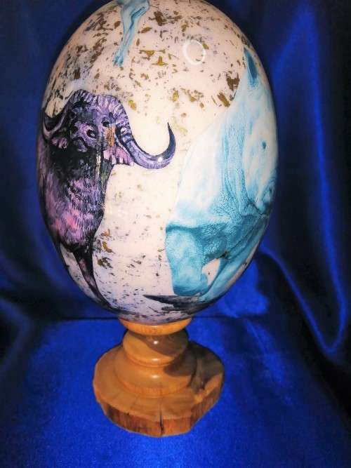 Stunning Big 5 decorated on a Ostrich egg on a wooden plinth