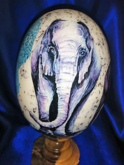 Stunning Big 5 decorated on a Ostrich egg on a wooden plinth