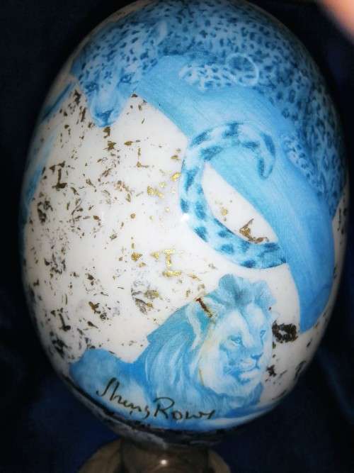 Stunning Big 5 decorated on a Ostrich egg on a wooden plinth