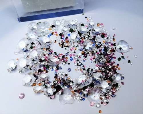 Offer SWAROVSKI Crystal Large amount of crystals and hearts.To use around your display + two others#