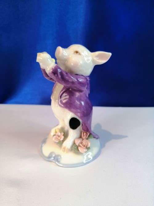 Old Porcelain Pig Playing the Flute