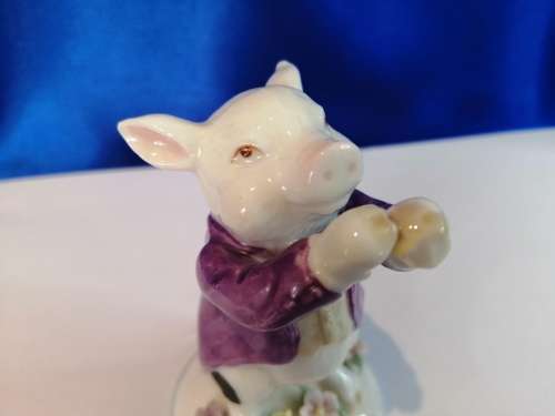 Old Porcelain Pig Playing the Flute