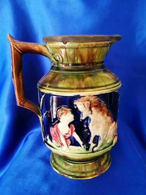 An antique English pottery wonderful Majolica boy and dog Jug Pitcher C.1870
