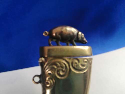 Circa 1890 Brass Vesta Case, or match case,chatelaine tusk shaped with a pig or boar on the lid #