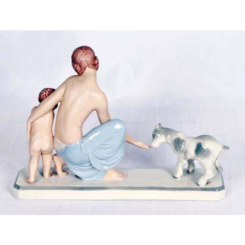 Royal Dux figural group of a mother a child with goat, pink triangle mark
