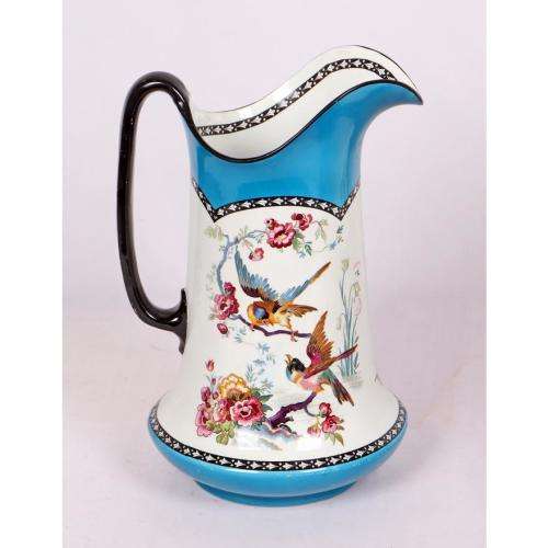 Large H and K Tunstall wash basin and jug decorated with birds amongst foliage