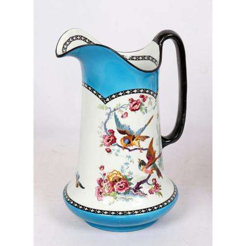 Large H and K Tunstall wash basin and jug decorated with birds amongst foliage