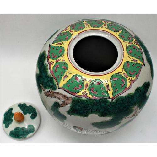 Chinese Famille Rose jar and cover decorated with storks amongst pine trees