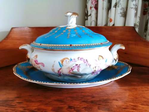 Sevres-style two-handled tureen and stand decorated with cherubs