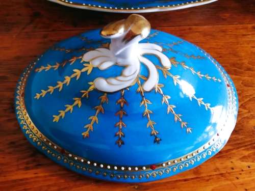 Sevres-style two-handled tureen and stand decorated with cherubs