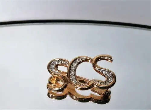 Swarovski Crystal Gold tone and Clear Crystal Brooch Pin of SCS
