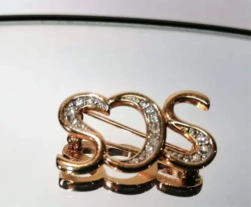 Swarovski Crystal Gold tone and Clear Crystal Brooch Pin of SCS