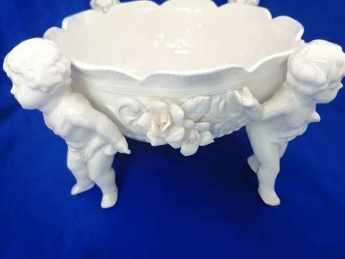 Beautiful White Italian Continental blanc de Chine center bowl depicting four putti Cherubs