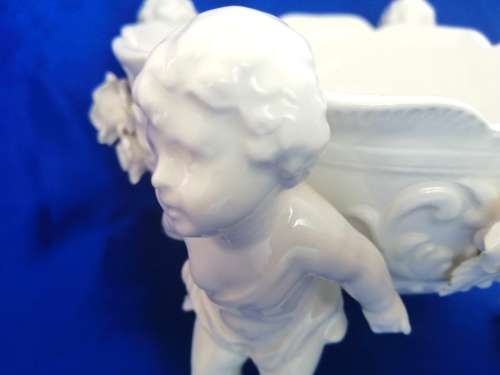 Beautiful White Italian Continental blanc de Chine center bowl depicting four putti Cherubs