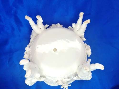 Beautiful White Italian Continental blanc de Chine center bowl depicting four putti Cherubs