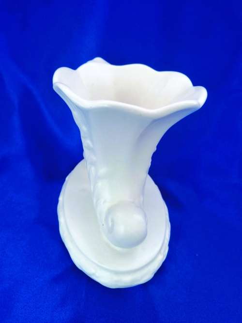 Staffordshire Heirloom Cherub Figurine Next to Vase