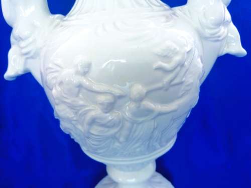 Faiarte blanc de china two-handled vase depicting cherubs angels