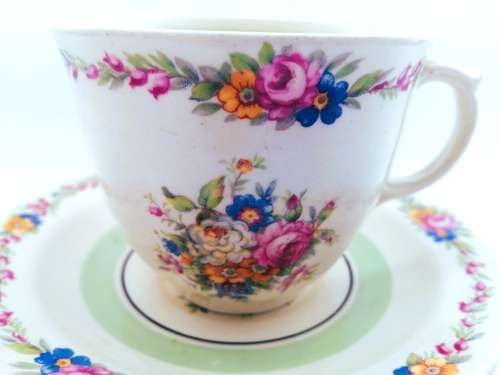 Cup and Saucer Made by Woods Ivory Ware England