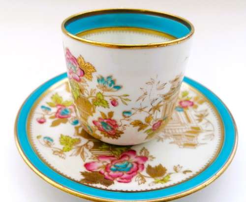 Stunning Demitasse Cup and Saucer Bisto mark White with gold and blue trim and prett