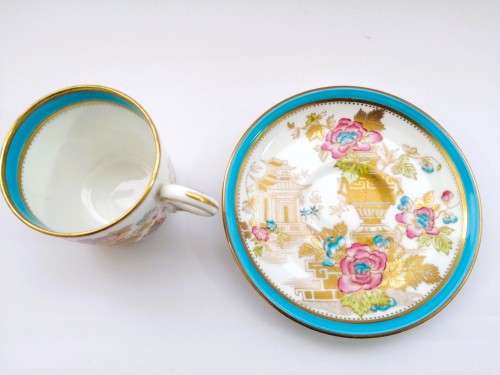 Stunning Demitasse Cup and Saucer Bisto mark White with gold and blue trim and prett