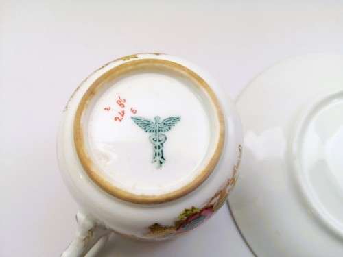 Stunning Demitasse Cup and Saucer Bisto mark White with gold and blue trim and prett