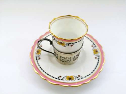 Aynsley coffee cup and saucer with silver holder, Birmingham, Deakin and Francis Ltd, 1926, 26g