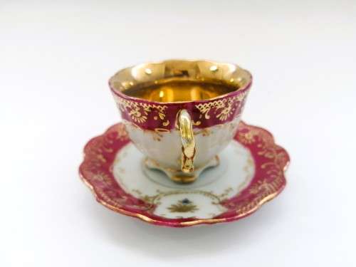 stunning old demitasse footed cup and sauce duo